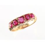 An 18ct yellow gold certificated untreated Burmese ruby five stone ring, the cushion cut rubies