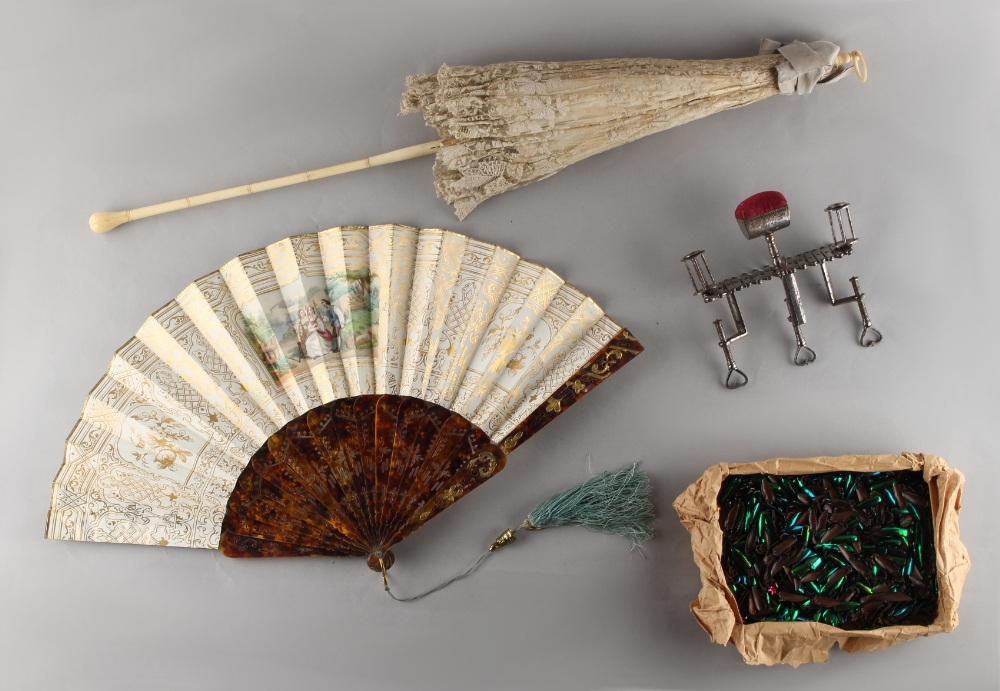 Property of a lady - a Victorian ivory & lace folding parasol; together with a tortoiseshell &