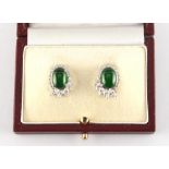 A very fine pair of white gold certificated untreated jadeite & diamond earrings, with clip & post