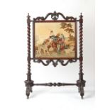 Property of a lady - an early Victorian carved rosewood framed firescreen with barleytwist