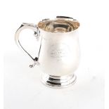 Property of a deceased estate - a silver baluster mug or tankard, with engraved presentation