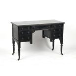 Property of a deceased estate - a late Victorian ebonised desk, in the manner of E.W. Godwin, the