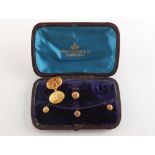 Property of a gentleman - a cased part set of four 15ct gold studs, approximately 4.7 grams