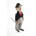 Property of a lady - a rare 1930's Schuco clockwork figure of Charlie Chaplin, 6.5ins. (16.5cms.)