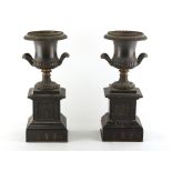 Property of a deceased estate - a pair of late 19th century patinated bronze & black marble urns,