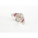 Property of a gentleman - an early 20th century Art Deco platinum diamond & ruby ring, the two