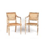 Property of a deceased estate - a pair of Regency style painted & cane panelled elbow chairs (2).