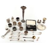 Property of a deceased estate - a box containing assorted silver items including a three piece