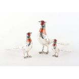 Property of a deceased estate - a graduated set of three modern English silver & enamel models of