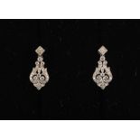 Property of a deceased estate - a pair of 18ct white gold diamond pendant earrings, with post &