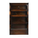 Property of a deceased estate - an oak Globe Wernicke four section stacking bookcase with drawer