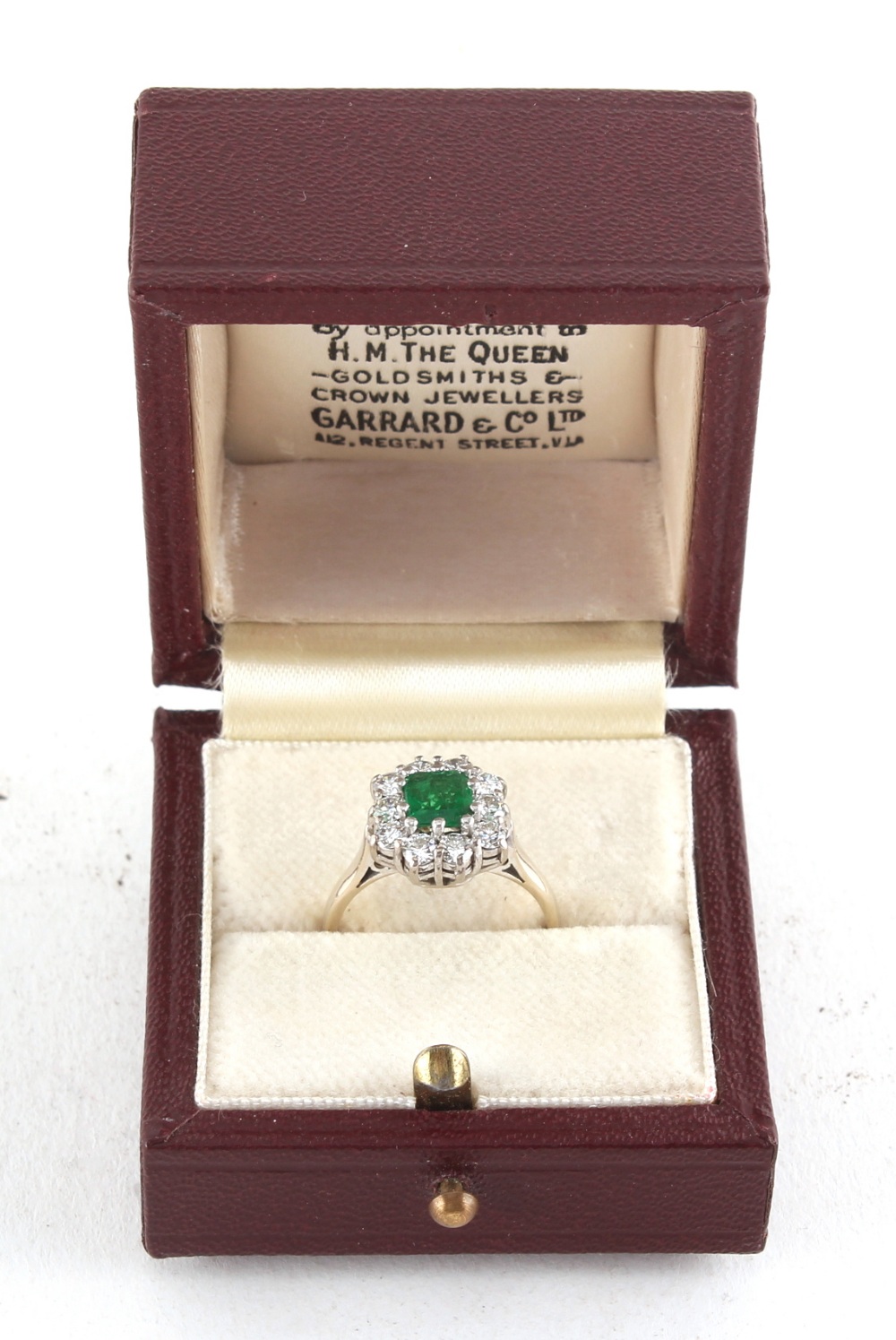 Property of a lady - an 18ct white gold emerald & diamond cluster ring, the emerald cut emerald - Image 4 of 4