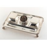 Property of a deceased estate - a large Edwardian silver inkstand, the central well missing its