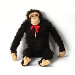Property of a gentleman - a very large life size soft toy chimpanzee, 1950's, probably by Schuco,