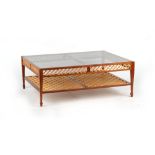 Property of a gentleman - a well made modern glass topped rectangular two-tier coffee table, 47 by