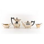 Property of a lady - a silver four piece tea set, the teapot with engraved presentation