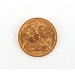 Property of a lady - gold coin - a 1965 QEII gold full sovereign.