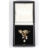 An Art Nouveau style 18ct yellow gold plique a jour diamond & pearl brooch, indistinctly marked,