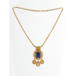 Property of a gentleman - a high carat yellow gold lapis lazuli necklace, the fringed pendant with
