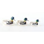 Property of a deceased estate - a graduated set of three modern English silver & enamel models of