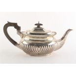 Property of a gentleman - an early 20th century silver teapot, with half fluted decoration, Mappin &