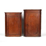 Property of a lady - two Georgian oak corner wall cabinets, the taller with adapted top to