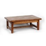 Property of a gentleman - a large elm rectangular topped coffee table, the top 51.75 by 32.5ins. (