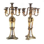 Property of a deceased estate - a pair of 19th century French ormolu six light candelabra, with faun