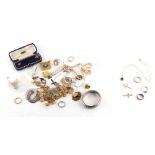 Property of a deceased estate - a bag containing assorted jewellery including three gold rings,