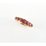 Property of a deceased estate - a late Victorian 18ct gold ruby seven stone ring, London 1900, set