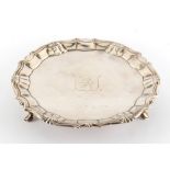 Property of a lady - a George II silver salver, with hoof feet, engraved crest to centre, William