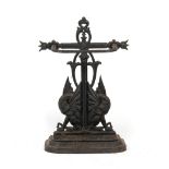 Property of a lady - a Victorian black painted cast iron stickstand.