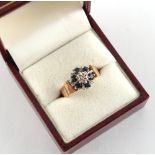 Property of a deceased estate - a modern 9ct yellow gold sapphire & diamond cluster ring,