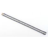 A fine Art Deco style white gold sapphire & diamond link bracelet, the box links with engraved