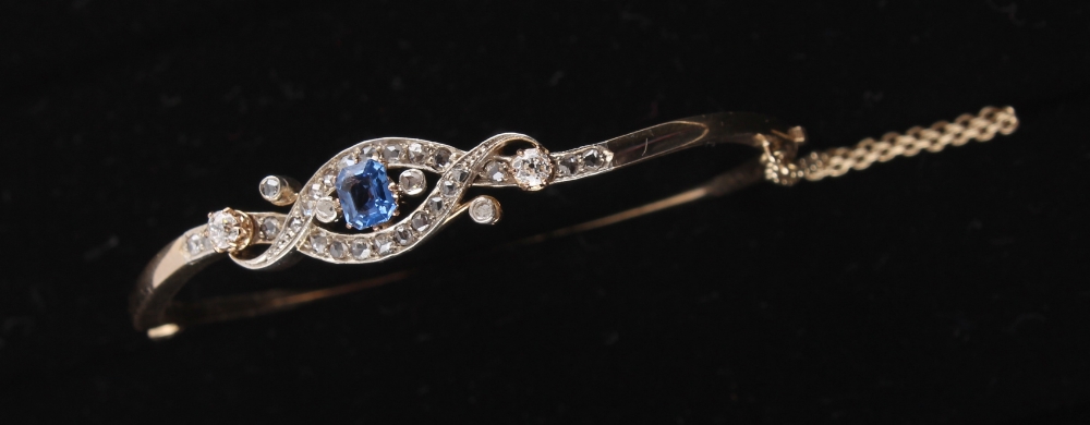 A late 19th / early 20th century 14ct yellow gold sapphire & diamond hinged bangle, the octagonal - Image 2 of 2