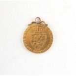 Property of a gentleman - gold coin - a 1789 George III spade guinea, adapted as a pendant.