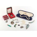 Property of a lady - a bag containing assorted jewellery including a John Hart silver Iona brooch