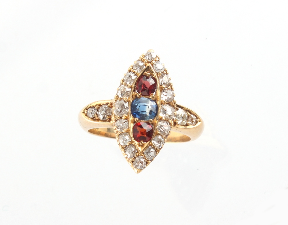 An early 20th century 18ct yellow gold ruby sapphire & diamond navette shaped ring, size M.