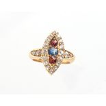 An early 20th century 18ct yellow gold ruby sapphire & diamond navette shaped ring, size M.