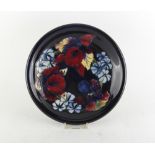 Property of a deceased estate - a Moorcroft 'Orchid & Spring Flowers' pattern circular dish, late