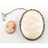 Property of a lady - an oval shell cameo brooch depicting two maidens & an eagle, 61mm long;