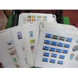 A Collection of Mint and Used World Stamps, on album pages, stock cards and in packets, Countries,