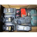 Eight 1:18th/1:24th Scale Diecast Model Cars, by Burago, Maisto and other including Burago 1:24th