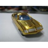 A Dinky 'Ed Straker's Car, in gold, overall very good, unboxed.