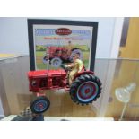A Britains Collectables Diecast Model David Brown 900 Tractor, (red), #08716, wooden display plinth,