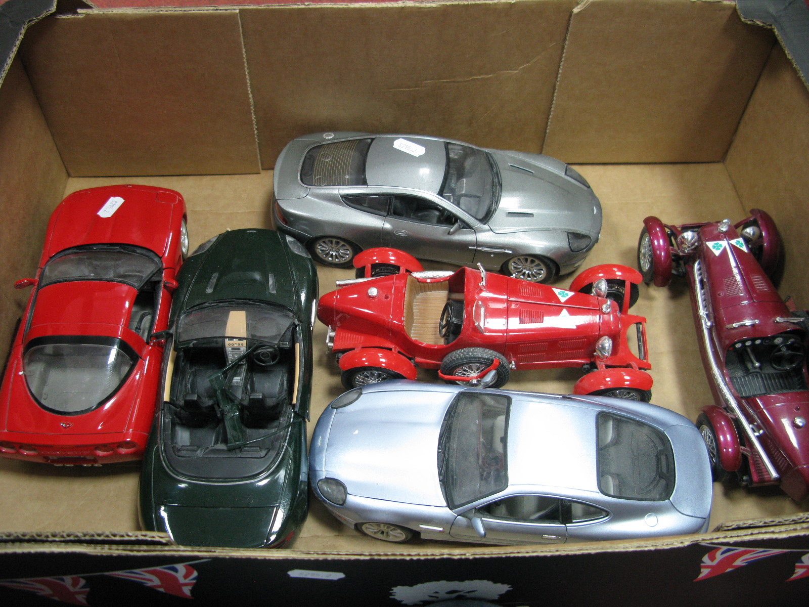 Six 1:18th Scale Diecast Model Cars, by Burago, Minichamps, Maisto, The Beanstalk Group, including