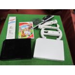 Two Nintendo Wii Gaming Consoles, (one black the other white), accessories, My Vet Practice Game,