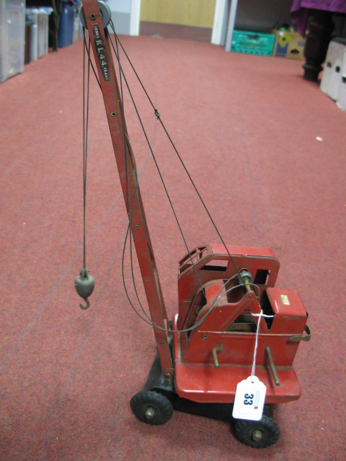 A Mid XX Century Pressed Steel Crane, by Tri-ang, playworn