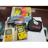 A Nintendo Gameboy Pocket Compact Hand Held Video Game System, (circa 1996) yellow, s/n MHI 9604302,