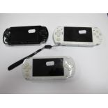 Three Sony PSP Handheld Gaming Consoles, (two white, one black), playworn, untested.